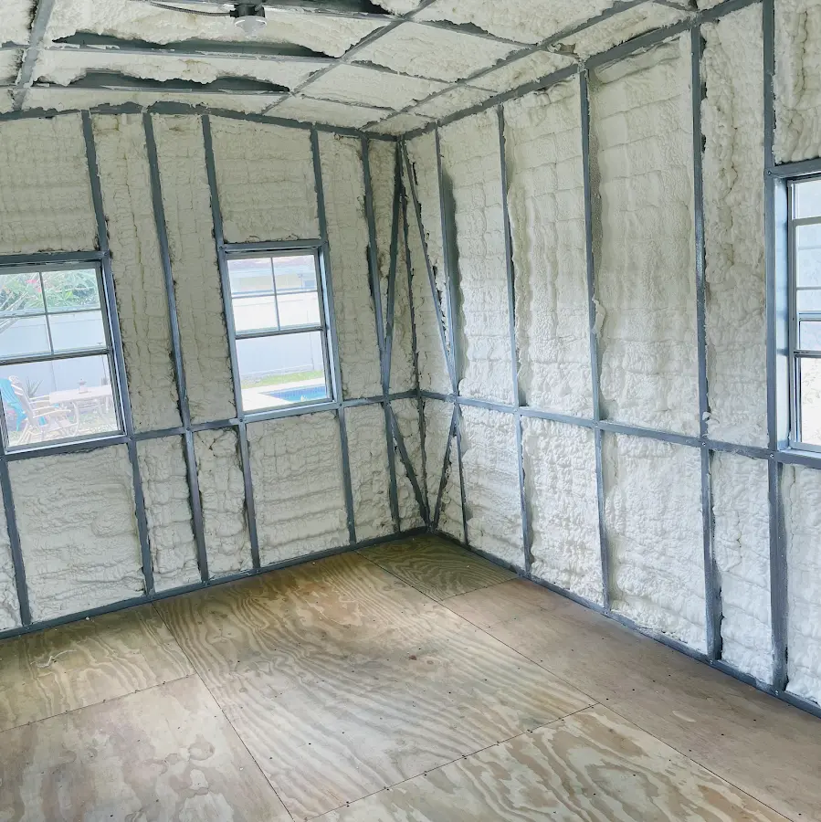 Closed-cell spray foam insulation applied to wall cavities in a residential project in Lexington